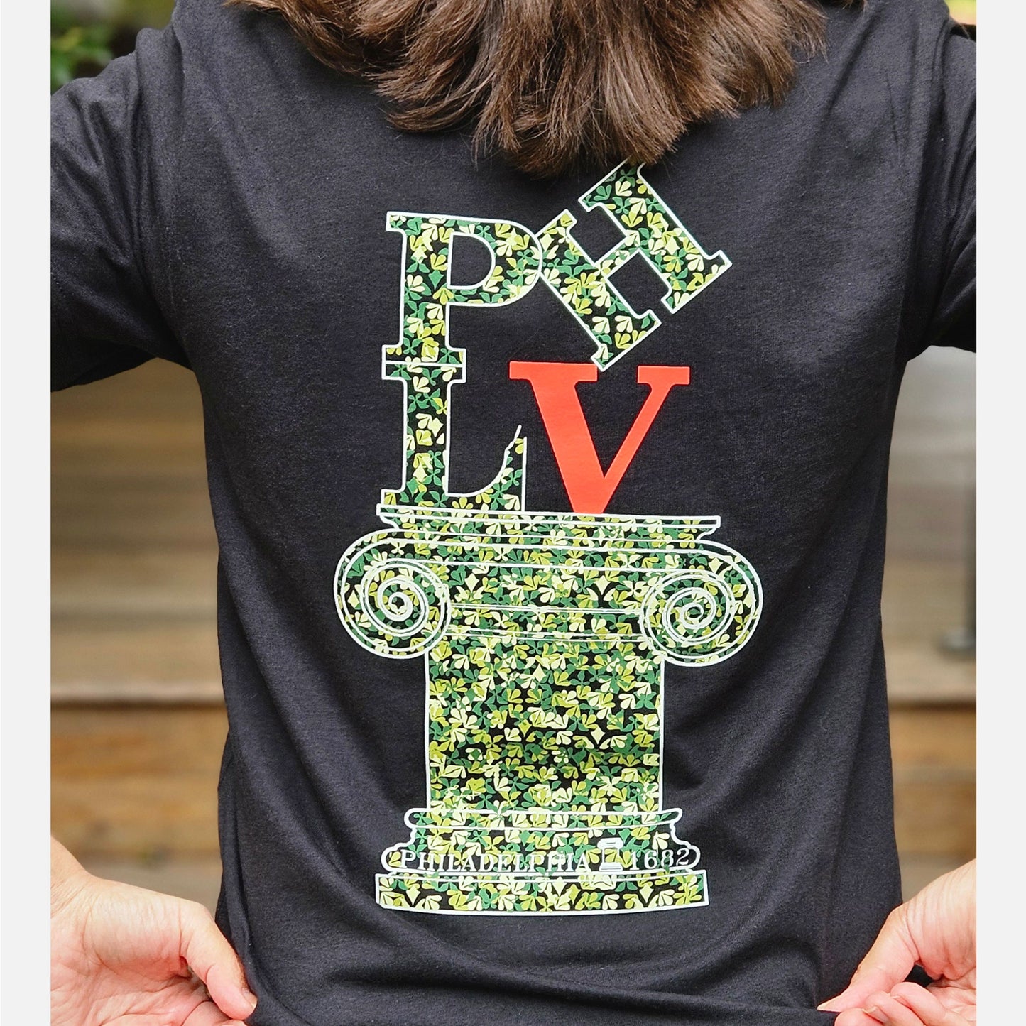 Philadelphia (PHLV) on Ionic Greek column with Lenape camouflage background - graphic T-shirt - black