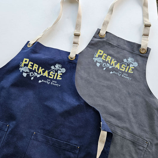 Perkasie Lenape floral motif graphic Apron - in grey or navy